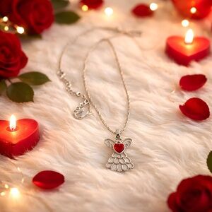 Avon Silver Toned Heart Angel Necklace
